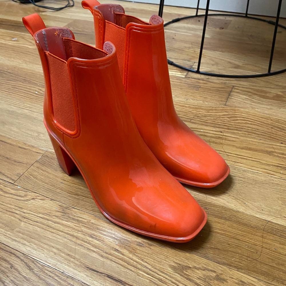 Orange rain boots